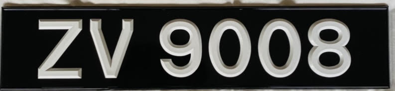  Plastic Rivited Digits Number Plates - Black oblong with white digits (Single)
